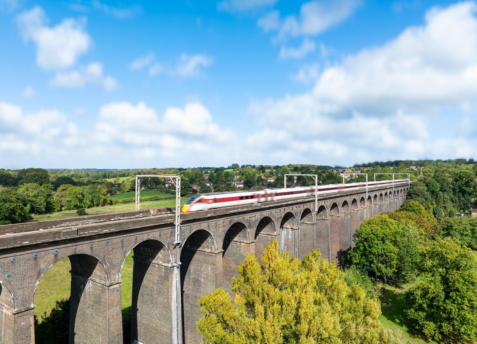 image of train passing across the viaduct bridge
